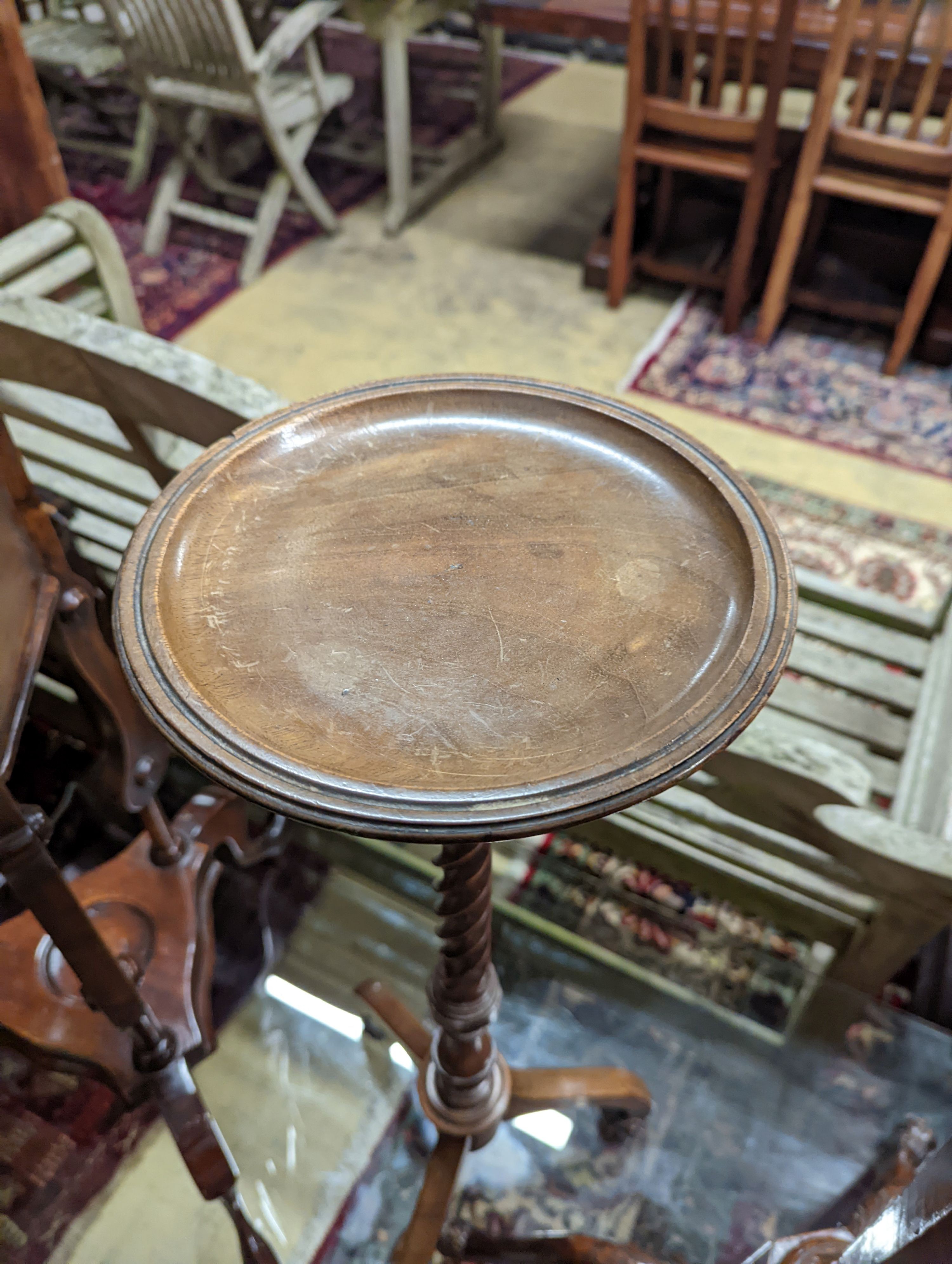 A George I style yew and walnut tripod candlestand, height 97cm, together with one other and a reproduction wash stand